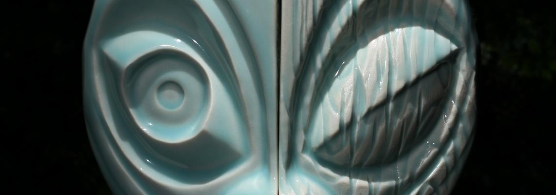Eye of the Tiki official event mug in celadon blue.